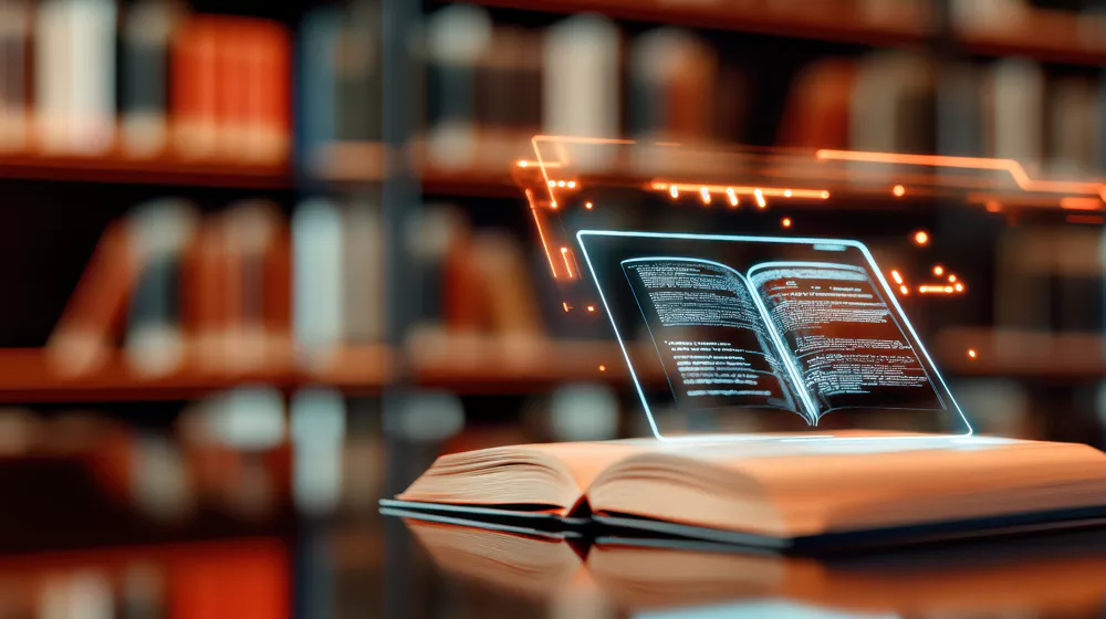 A digital and transparent overlay of an open book hovering above an real open book in a library representing artificial intelligence and innovation.